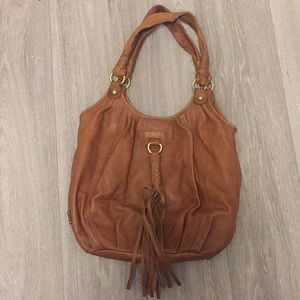 Brown leather UGG purse.